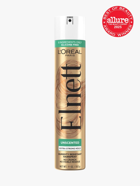 L’Oréal Paris Elnett Satin Extra Strong Hold Hair Spray in branded gold and white aerosol bottle on light gray background with red Allure Best of Beauty seal in the top right corner