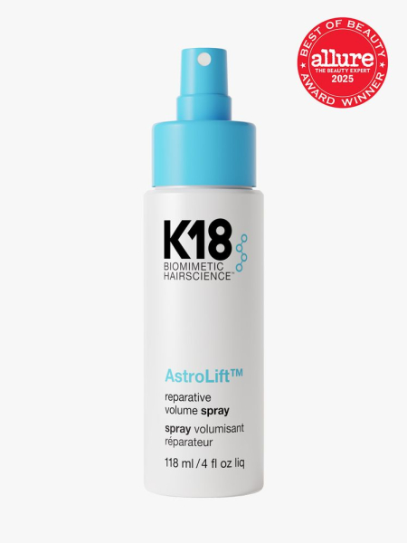 K18 AstroLift in branded white bottle with blue spray pump on light gray background with red Allure Best of Beauty seal in the top right corner