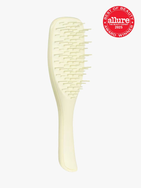 Tangle Teezer The Ultimate Detangler Extra Gentle in soft yellow color way on light gray background with red Allure Best of Beauty seal in the top right corner