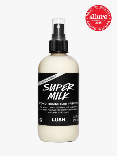 Lush Super Milk Conditioning Hair Primer in branded clear bottle with black spray pump on light gray background with red Allure Best of Beauty seal in the top right corner