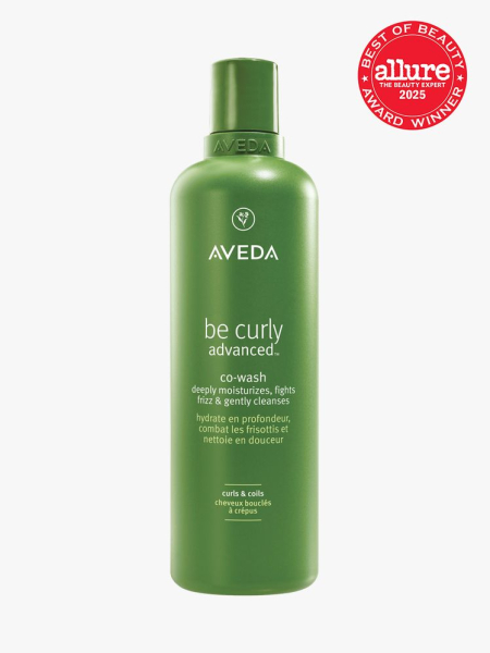 Aveda Be Curly Advanced Co-Wash in branded green bottle with cap on light gray background with red Allure Best of Beauty seal in the top right corner